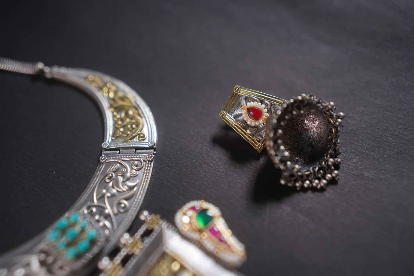 Gothica Roopkatha Handmade Statement Hasli Necklace set with Jhumkis with Meena work and dual tone